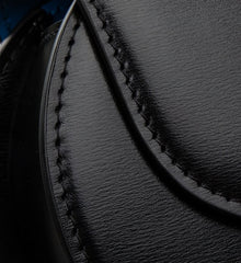Sophia Black Leather Top Handle Bag with Unique Clock Face Clasp