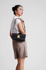 Timekeeper Black Leather Baguette Shoulder Bag with Unique Clock Face Clasp