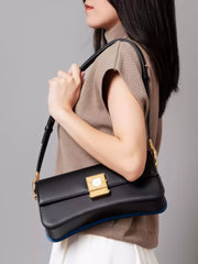 Timekeeper Black Leather Baguette Shoulder Bag with Unique Clock Face Clasp