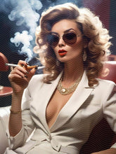 A Woman Sitting on the Chair Smoking