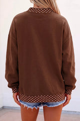Back view of brown sweatshirt with polka dot collar, cuffs and hem trim