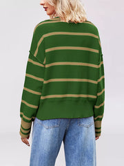 Back view on-model of green striped Johnny collar sweater with dropped shoulders and ribbed hem