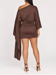 Full length studio back view of brown one shoulder draped bodycon mini dress