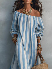 Close view of sky blue and white striped off shoulder dress bodice and sleeves