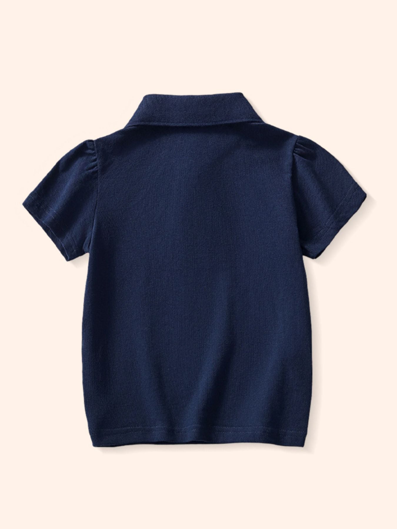 Back view of the plain dark navy children's short sleeve polo