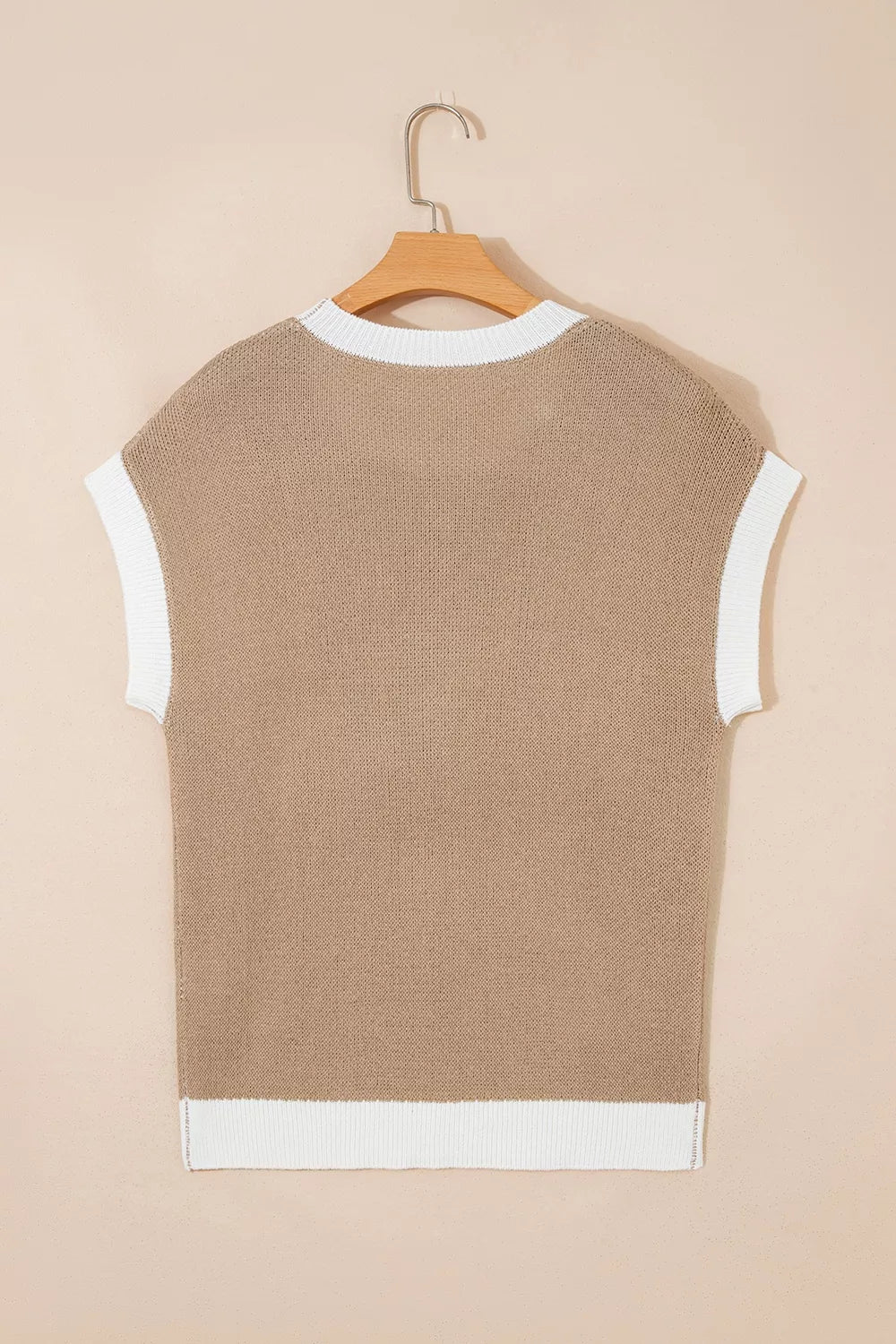 Hanging back view of a mocha short sleeve sweater with white contrast trim