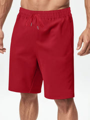 Men's casual shorts with a drawstring waist, available in regular and plus sizes.