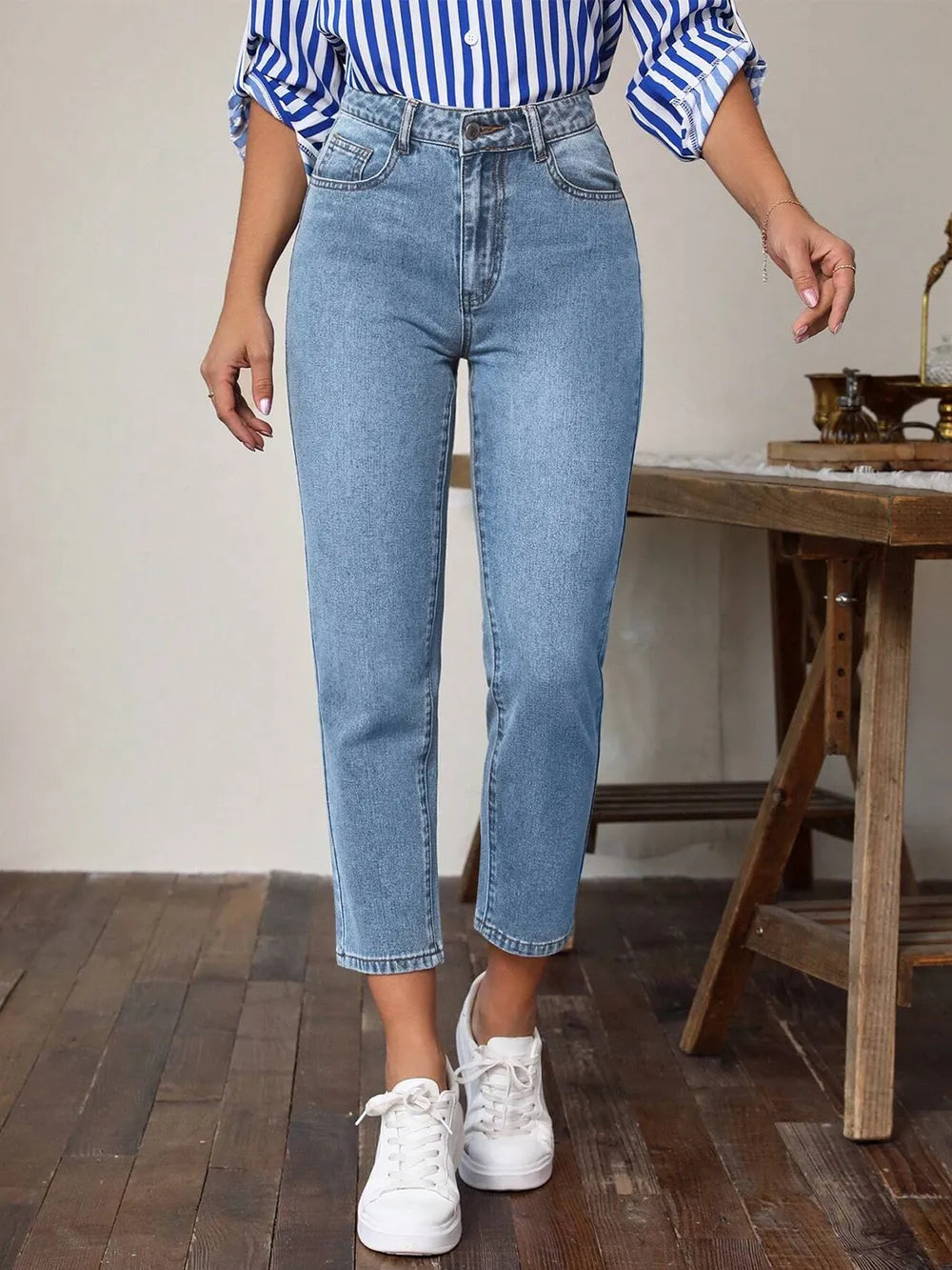 Women's high-waisted jeans with pockets in a non-stretch rayon blend.