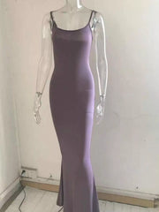 Front view of a mauve spaghetti strap bodycon maxi dress displayed on a clear mannequin indoors