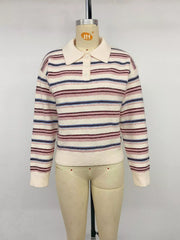 Front view of a cream striped polo sweater with a button placket on a mannequin