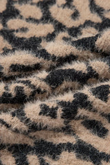 Close up of fuzzy tan and black leopard print knit texture.