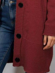 Close view of the burgundy hooded cardigan buttons pocket and knit texture