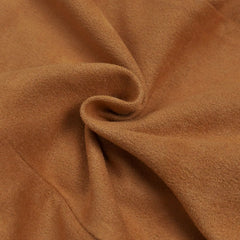 Caramel suede fabric swirl close up showing soft texture of bodycon dress