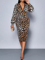 Front full view of white leopard print bodycon midi dress holding a clutch
