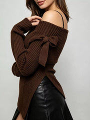 Side view of brown off shoulder ribbed knit top showing bow tie and asymmetric hem