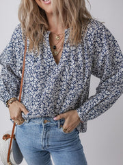 Blusa de manga larga con muescas y estampado floral