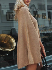 Side view of camel turtleneck poncho sweater with wide sleeves