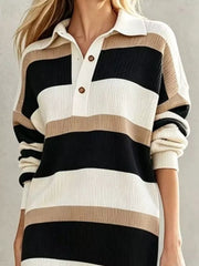 Closeup of black striped sweater dress bodice showing polo collar and button placket
