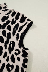 Close up detail of the cap sleeve and armhole on the black and cream leopard print sweater.