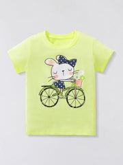 Flat lay front view of children's light green t-shirt with rabbit riding a bicycle graphic