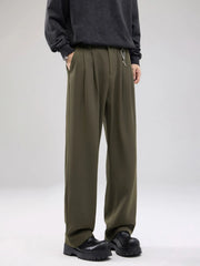 Men's wide leg pants with a drawstring waist and pockets.