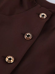 Brown button down mini dress detail showing gold dome buttons on placket close