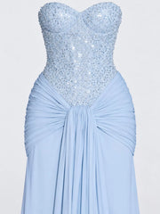 Blue strapless sequin corset bodice and knotted draped waist, close detail view