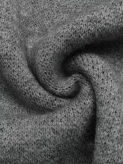 Close-up of soft gray knit fabric showing its fine textured weave