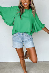 Blusa de media manga ancha con cuello redondo y volantes