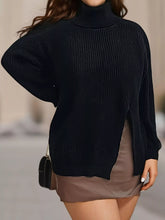 Black ribbed turtleneck sweater with side slit worn on model