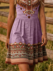 Close view of violet tribal print dress skirt with patterned border hem