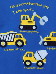 Close view of the yellow construction vehicle graphics and labels on blue fabric