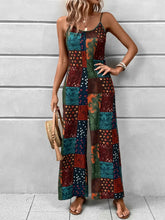 Women's printed jumpsuit with a scoop neckline and spaghetti straps.