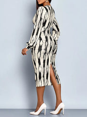 Side and back view of white striped bodycon midi dress with side slit