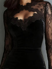 Detail view of the lace cutout bodice of a black long sleeve velvet bodycon dress