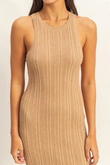 Close view of the round neckline and ribbed bodice of a taupe knit dress