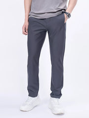 Men's dark gray slim-fit casual pants with pockets, available in plus sizes.