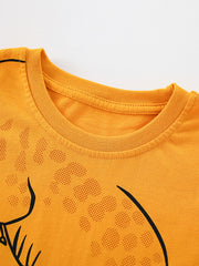 Close-up of the tangerine children's t-shirt neckline and dotted alligator print texture