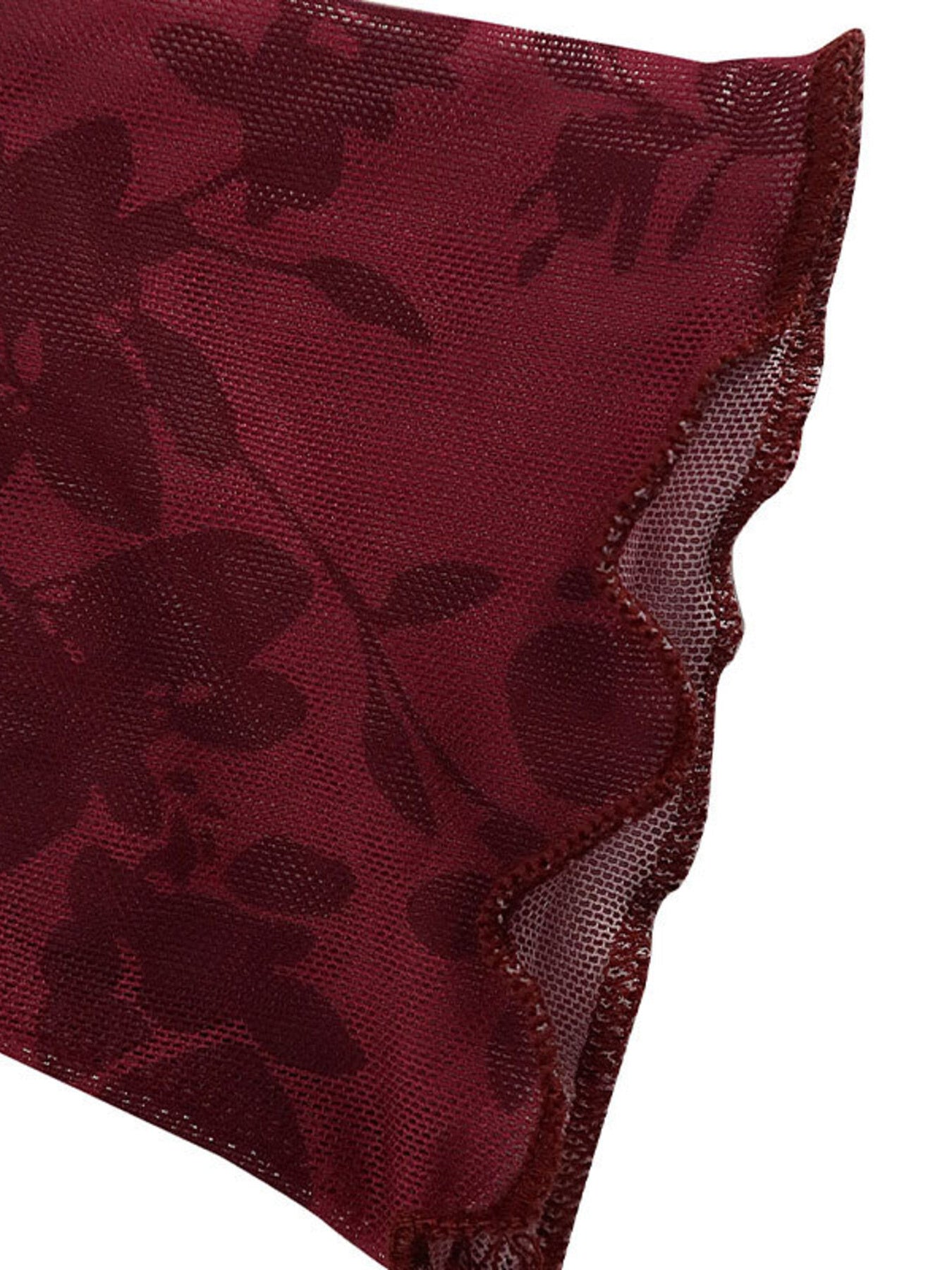 Burgundy floral mesh hem close up showing scalloped edge and sheer fabric detail