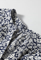 Blusa de manga larga con muescas y estampado floral