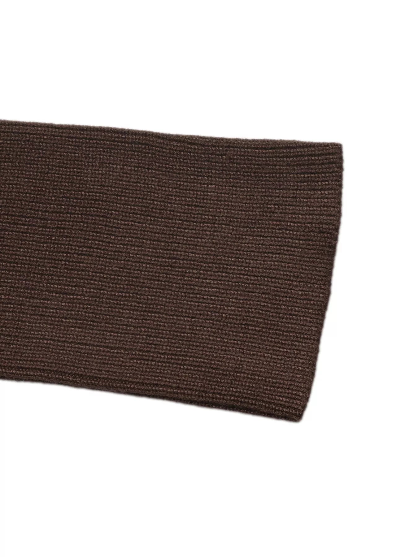 Close up of the brown ribbed knit cuff on the striped long sleeve top