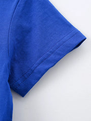 Close-up of royal blue children's short sleeve hem with neat double stitching