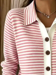 Close-up on-model view of pink and white striped collared cardigan with brown buttons