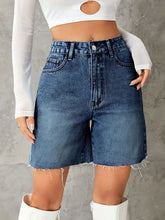 Women's denim shorts with buttons, pockets, and frayed hems.