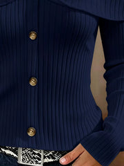 Close up of navy cold shoulder ribbed knit top bodice showing ribbing and front buttons