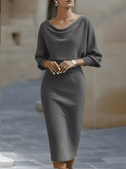 Front view of a gray cowl neck knit bodycon dress with wide batwing sleeves