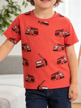 Front view of red children's T-shirt covered in small fire truck prints