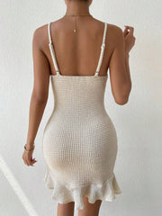 Beige twist front cutout ruffle hem bodycon mini dress with thin straps on model, back view