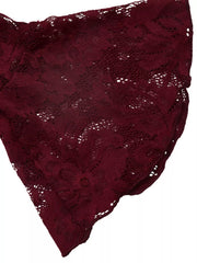 Close view of burgundy floral lace fabric from the flared sleeve of mini dress