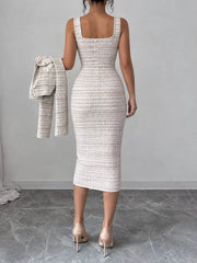 Back view of khaki tweed square neck dress held with the matching cardigan in hand